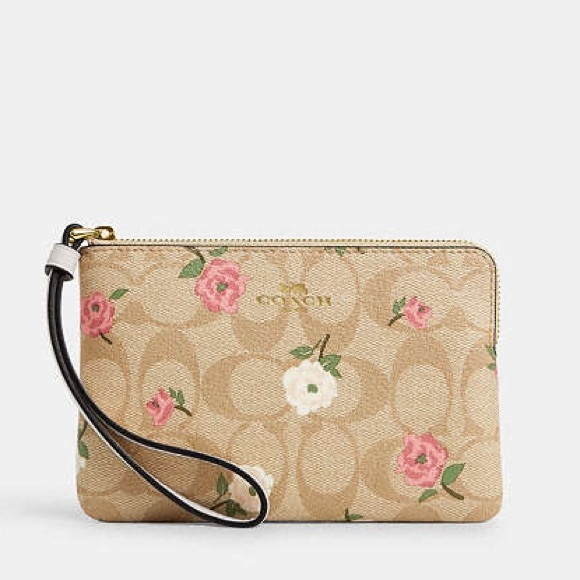 Coach Handbags - Coach NWT! Corner Zip Wristlet In Signature Canvas With Floral Print